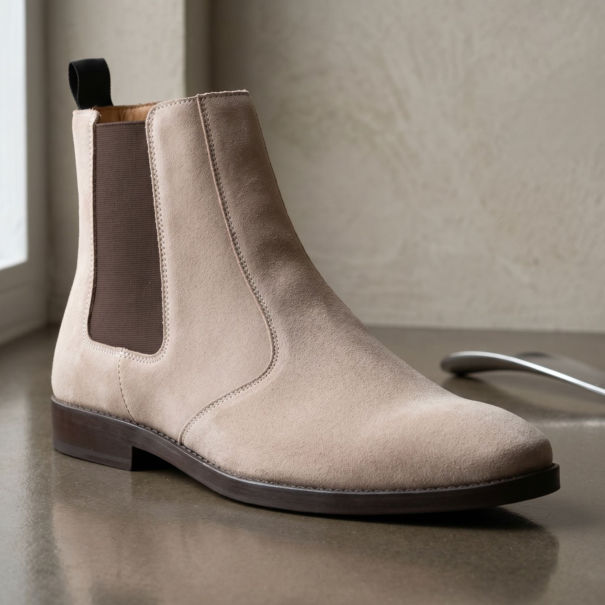 Close-up of Bolton cream suede leather Chelsea boot highlighting the micro-texture and craftsmanship of the ankle-high boot.